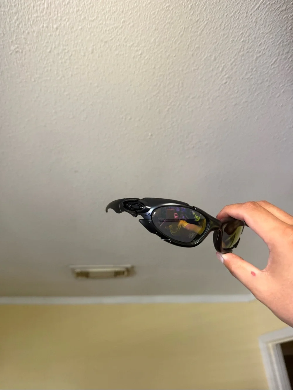 Oakley Wrap Sunglasses in Black with Yellow-Green Lensess